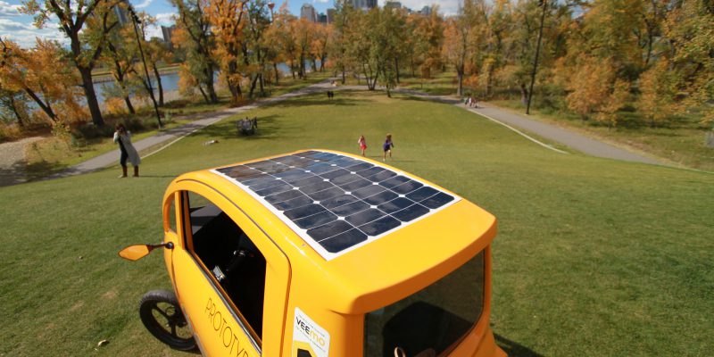 veemo grassy field solar panel sunshine